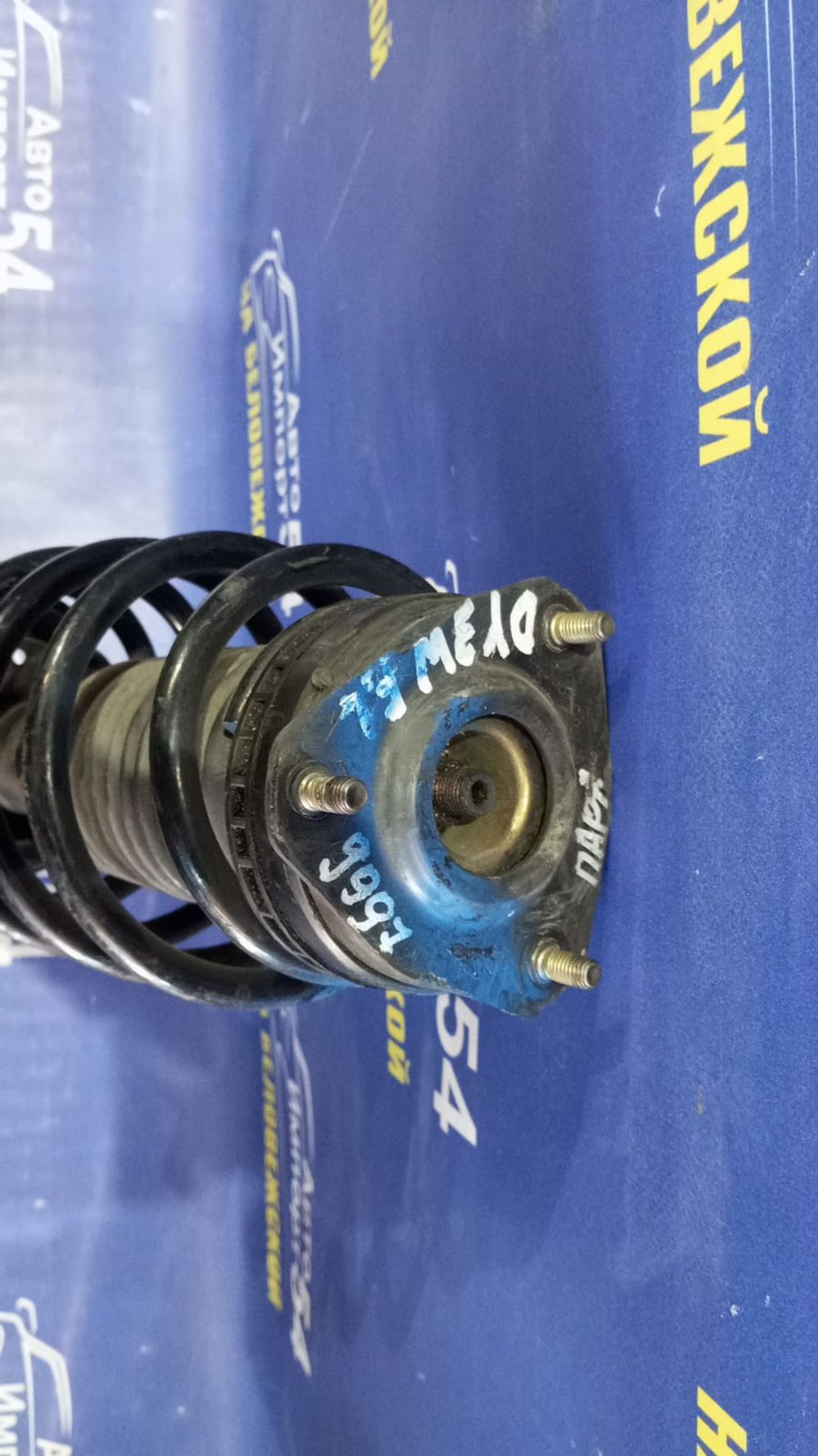 Стойка передняя левая MAZDA DEMIO 2002-2007