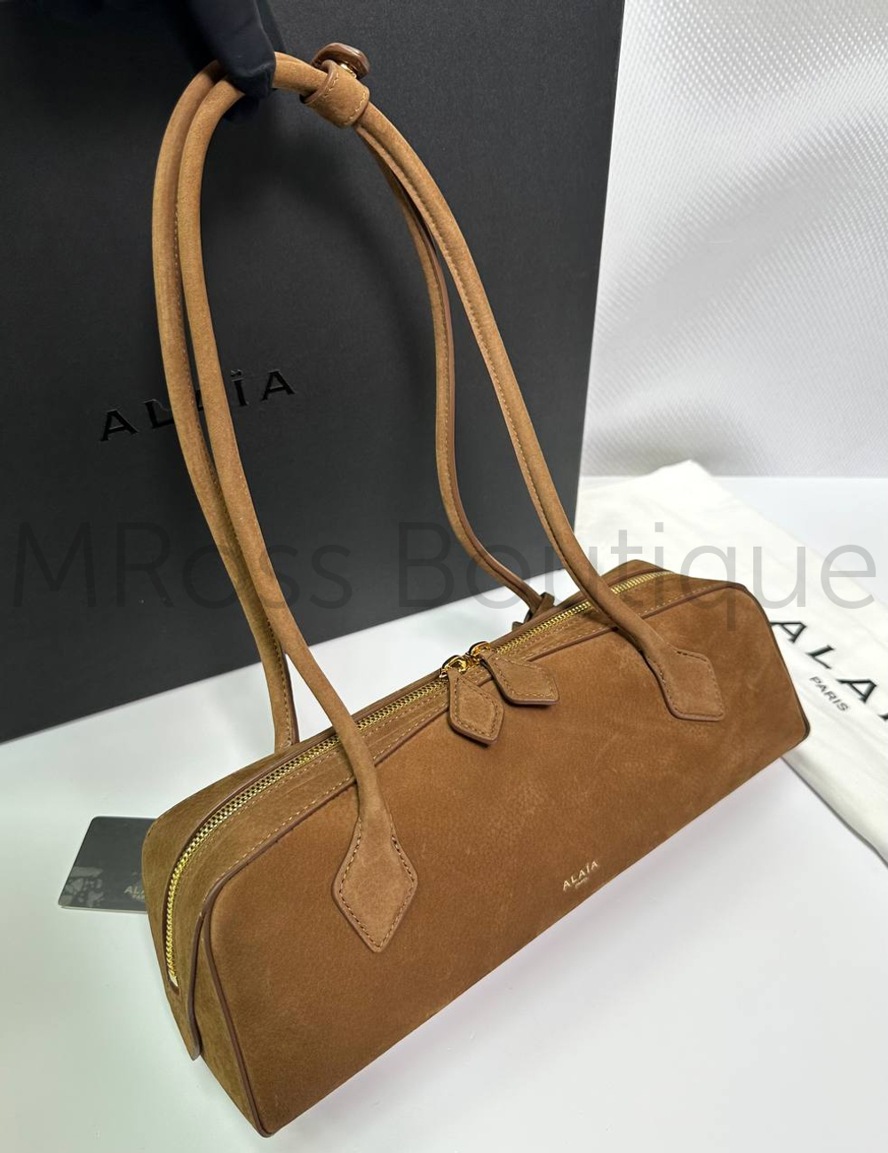 Женская сумка Alaia Le Teckel Medium коричневого цвета