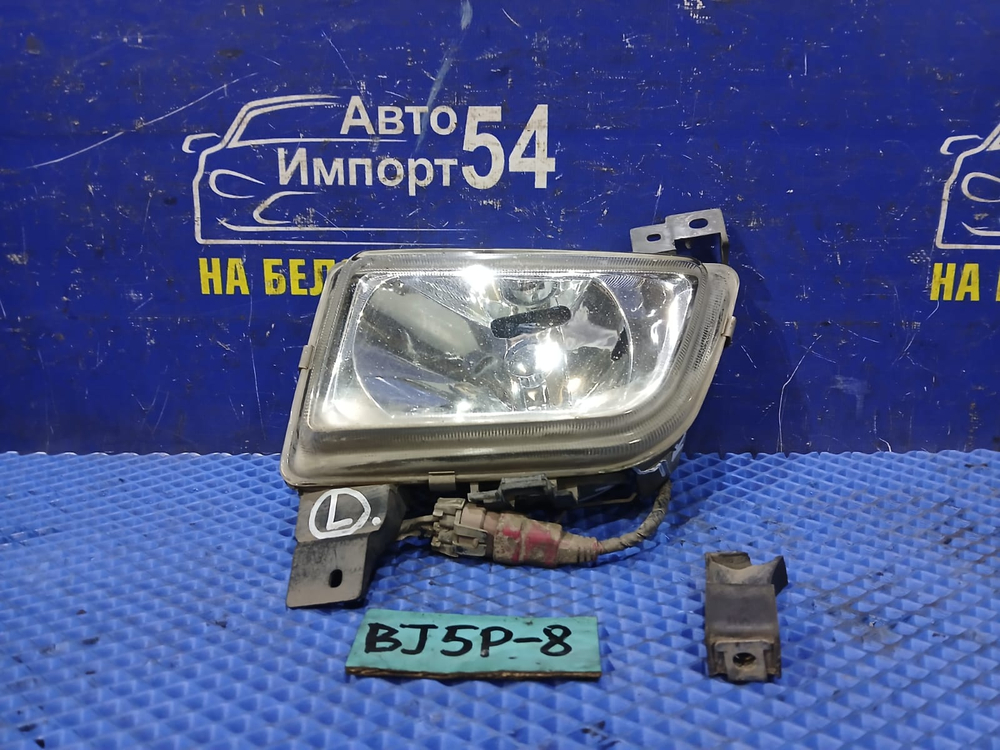 Туманка левая MAZDA FAMILIA 2003