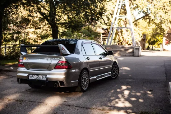 Задний бампер в стиле Evo для Mitsubishi Lancer 9