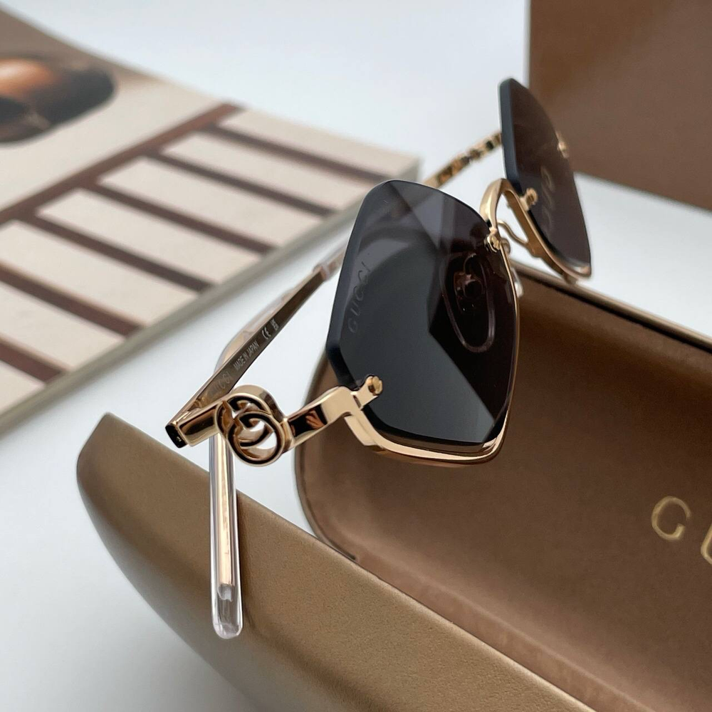 Солнцезащитные очки Gucci