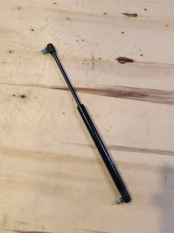 Амортизатор МАЗ-5440, 6430 облицовки радиатора (пружина газовая, усилие F320H) MEGAPOWER