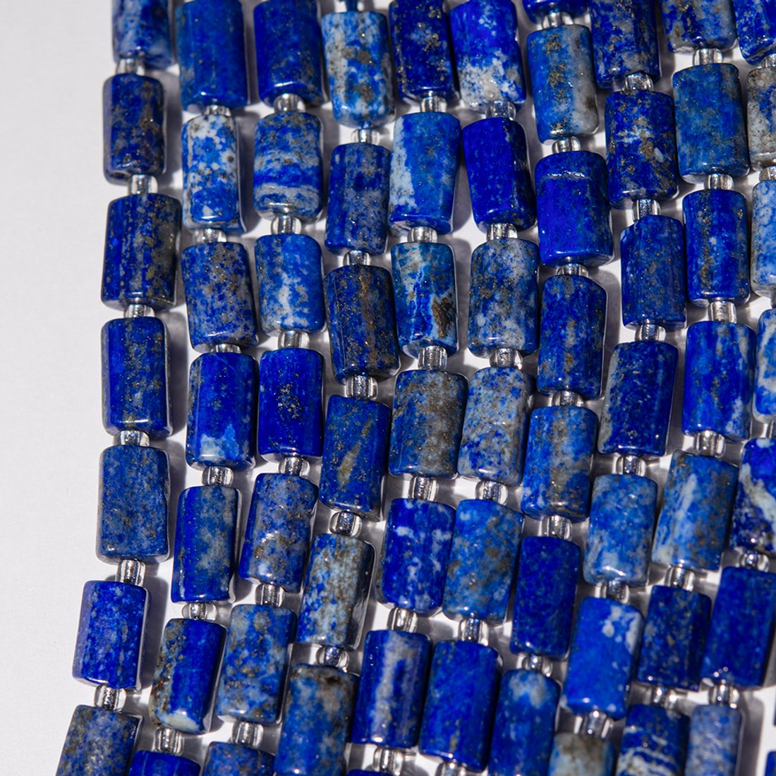 Лазурит натуральный, бочонки с гранями, 9,5-11*4,5-6,5мм