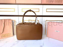 Женская кожаная сумка Miu Miu коричневая
