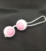 Вагинальные шарики со смещенным центром тяжести в силиконовой оболочке (розовый) (Цвет: розовый с белым)