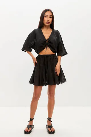 Юбка мини из хлопка stone wash черного цвета