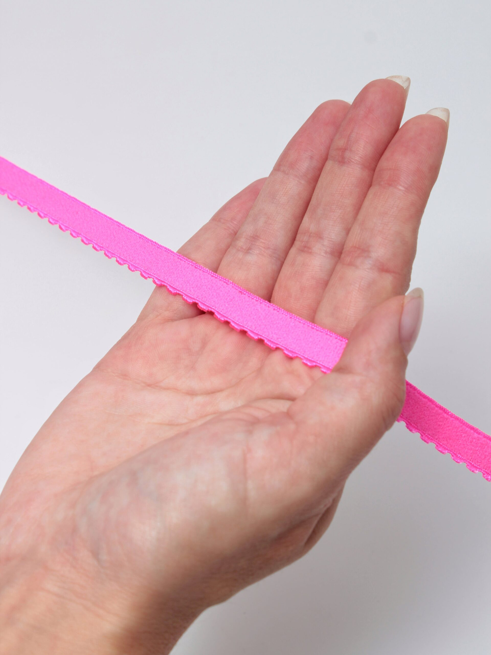 Резинка отделочная ярко-розовая неоновая ажурная ширина 10 мм с учетом фестона