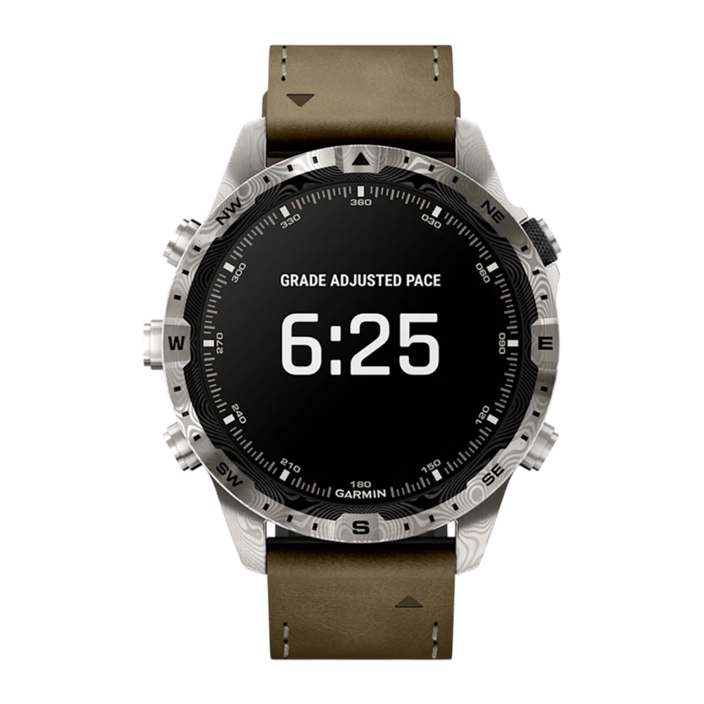 Спортивные часы Garmin MARQ Adventurer (Gen 2) Damascus Steel Edition, гибридный ремешок, чёрный силиконовый ремешок Безель и корпус из дамасской стали, AMOLED-дисплей с куполообразным сапфировым стеклом. Ремешок из кожи и фторэластомера и силиконовый рем