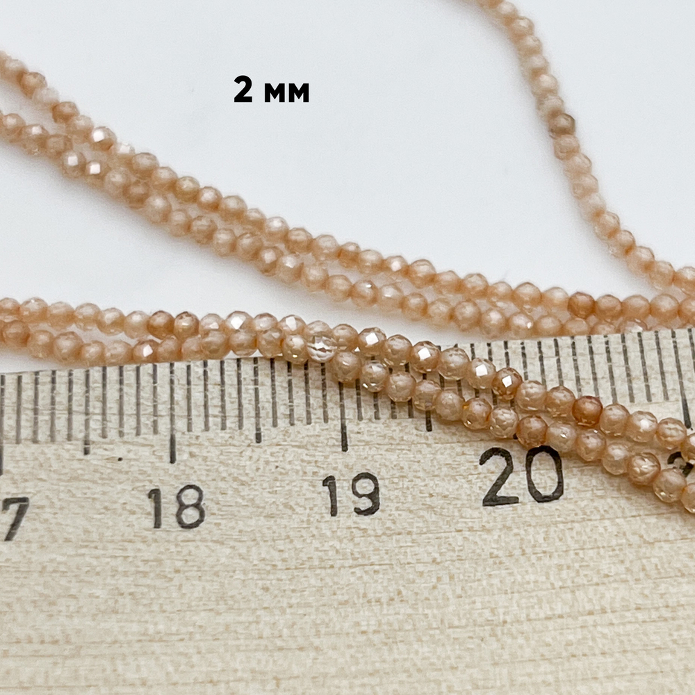 Фианит (кубический цирконий), цвет персиковый, размер 2 мм, цена за нить около 195 шт (38 см)