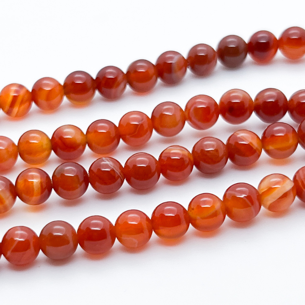 Агат тонированный бусины, цвет сердолик, диаметр 6,2-6,3 мм, цена за 30-31 шт (1/2 нити)