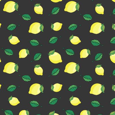 Лимоны с листьями на черном фоне