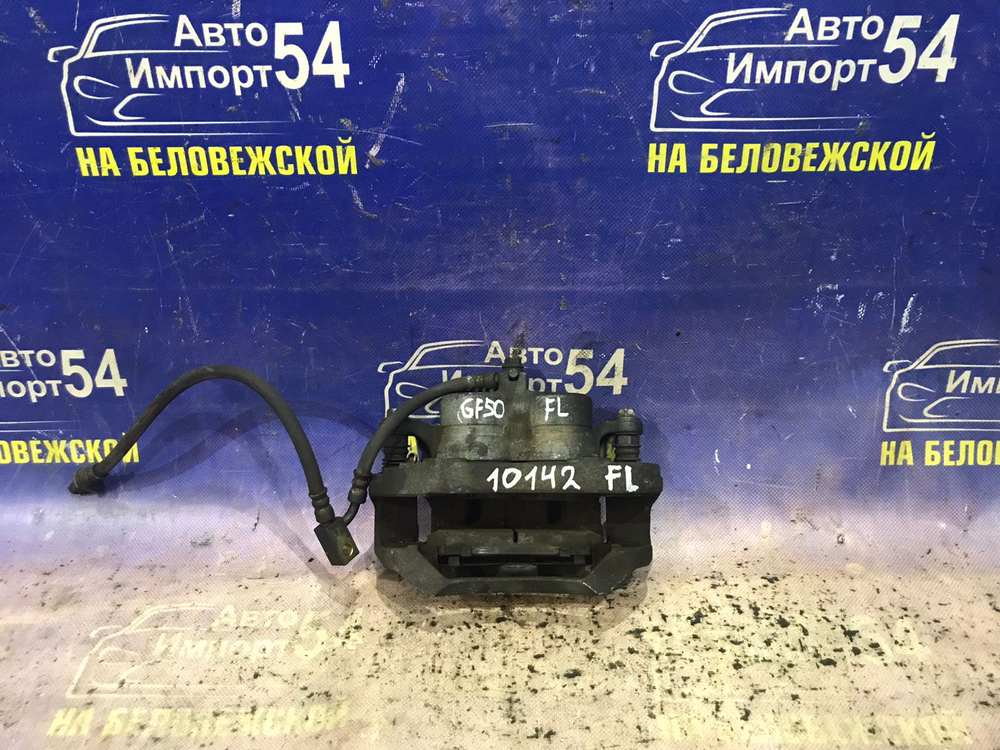 Суппорт тормозной передний левый NISSAN CIMA 2001-2010