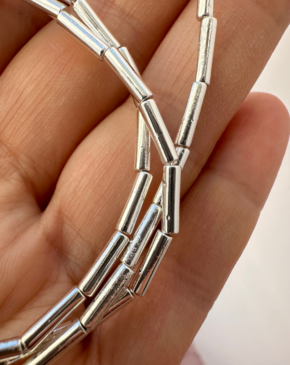 Нить гематитовых бусин "Трубочки" 2х8мм (уценка)