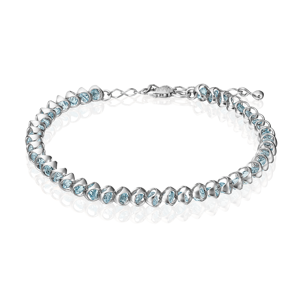 Браслет из белого золота с топазами