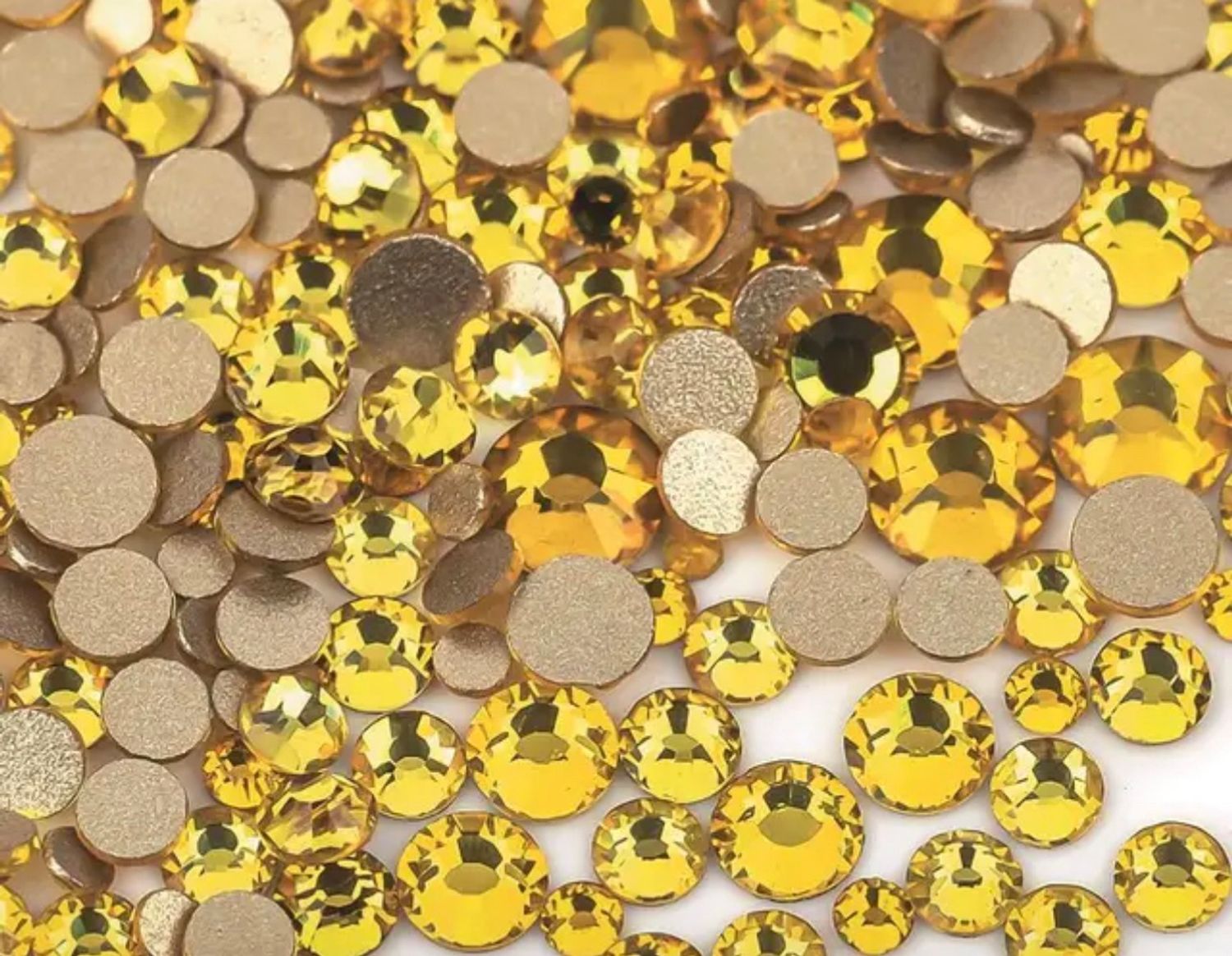 Стеклянные стразы  (размер микс) 1140шт, цвет желтый