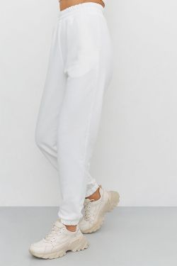 Джоггеры свободные без начеса кремового цвета
