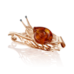 Брошь «Улитка» из красного золота с янтарём