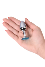 Серебристая конусовидная анальная пробка с голубым кристаллом - 7 см. (Цвет: голубой)