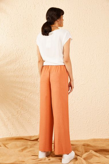 Qadın üçün enli ayaqlı, narıncı şalvar 10071013