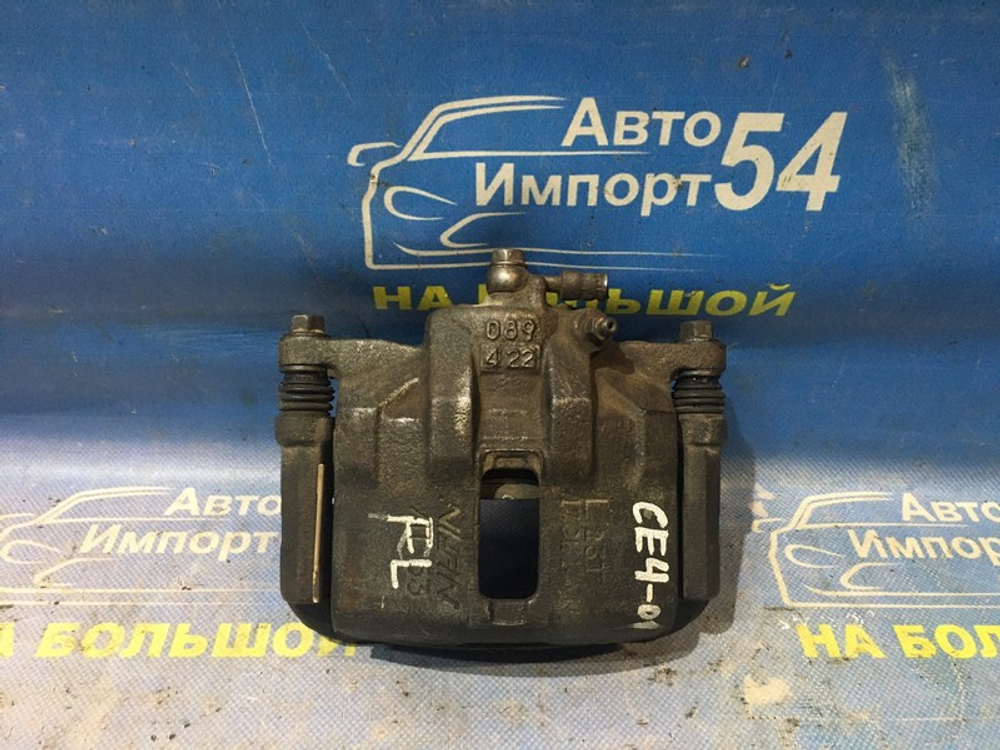 Суппорт тормозной передний левый Honda RAFAGA 1996