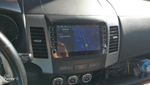 Магнитола для Mitsubishi Outlander XL, Peugeot 4007, Citroen C-Crosser - Carmedia OL-9636 (кнопки и крутилки) Android 13, TS20, 6+128Гб, CarPlay, 4G SIM-слот