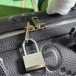 Средняя дорожная сумка Gucci Jumbo GG