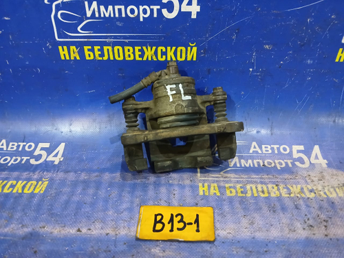 Суппорт тормозной передний левый NISSAN SUNNY 1990