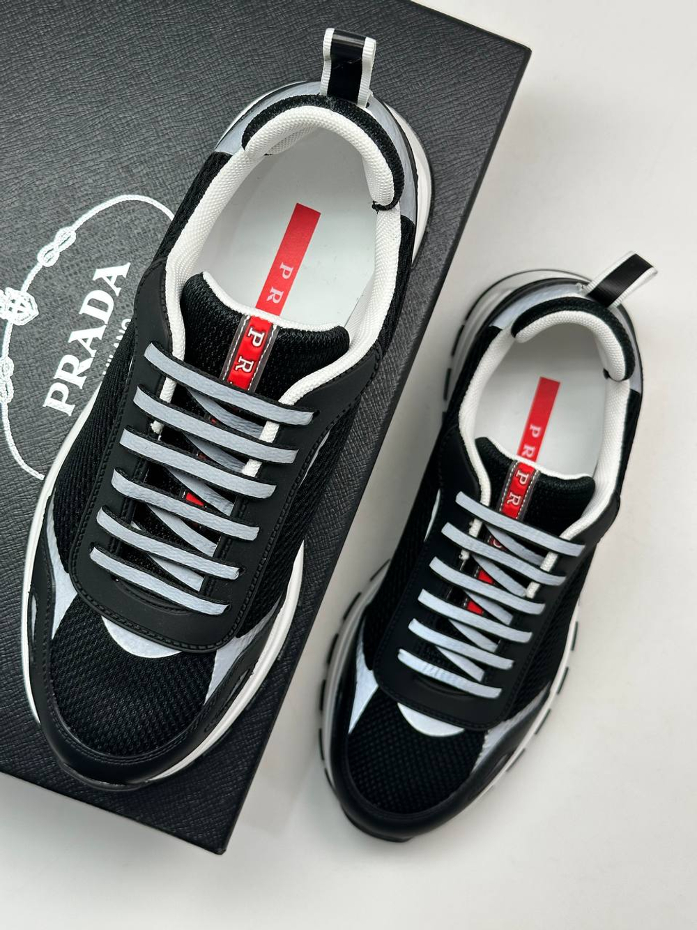 Кроссовки Prada