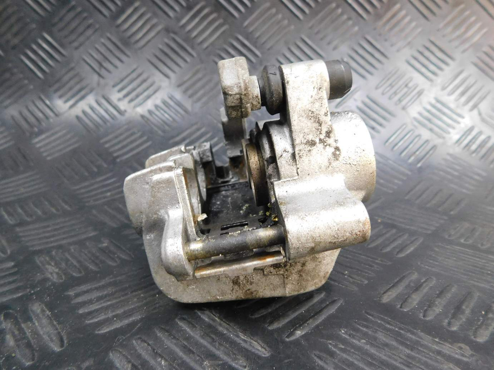 Суппорт тормозной передний Honda Shadow 400 NC34 052561