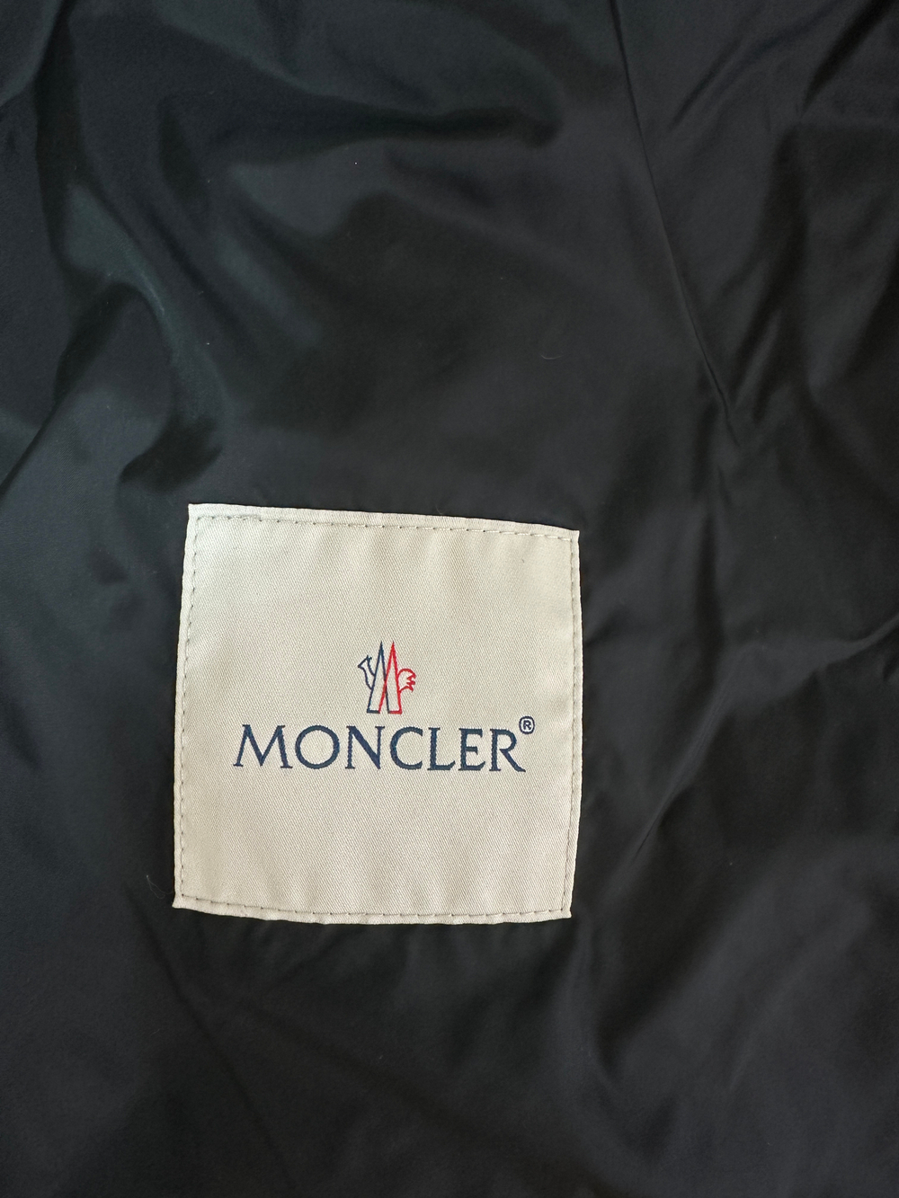 Пуховое пальто Moncler