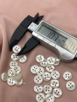 Пуговицы Гучч. на прокол молочные перламутровые