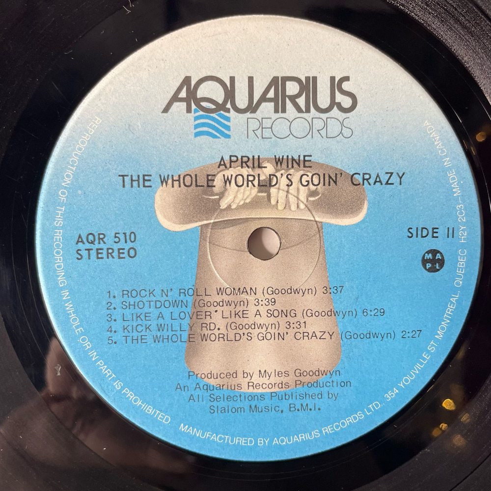 Винтажная виниловая пластинка LP April Wine The Whole World's Goin Crazy (Канада 1976)
