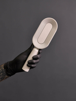 Самоочищающаяся расческа с кнопкой