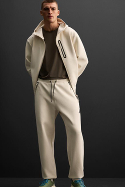 ZARA ДЖОГГЕРЫ ИЗ ВЫСОКОТЕХНОЛОГИЧНОЙ ТКАНИ С МОЛНИЯМИ, ЭКРЮ