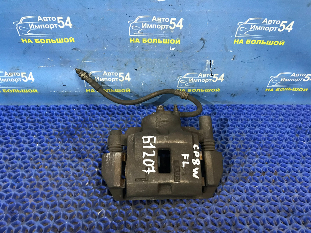 Суппорт тормозной передний левый MAZDA PREMACY 1999-2005