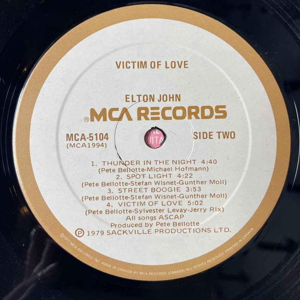 Винтажная виниловая пластинка LP Elton John Victim Of Love (Canada 1979)