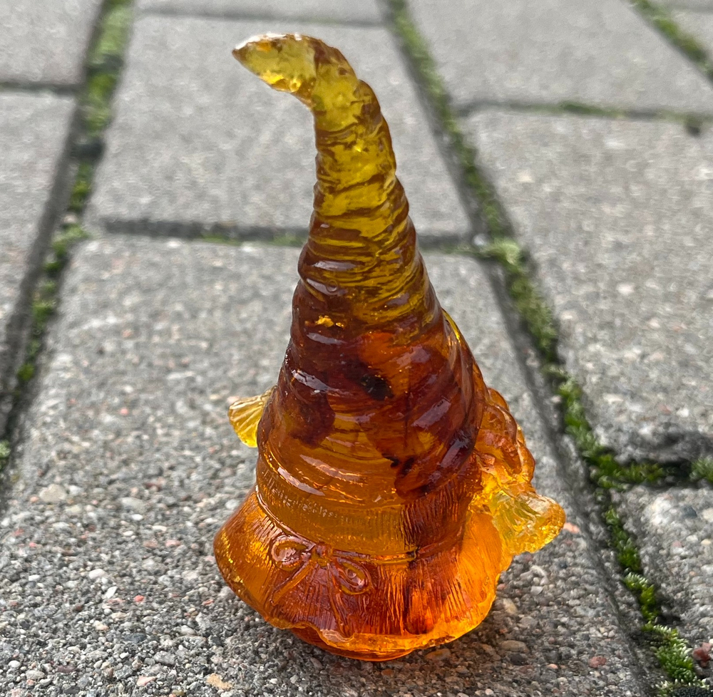 Милый гном с косичками