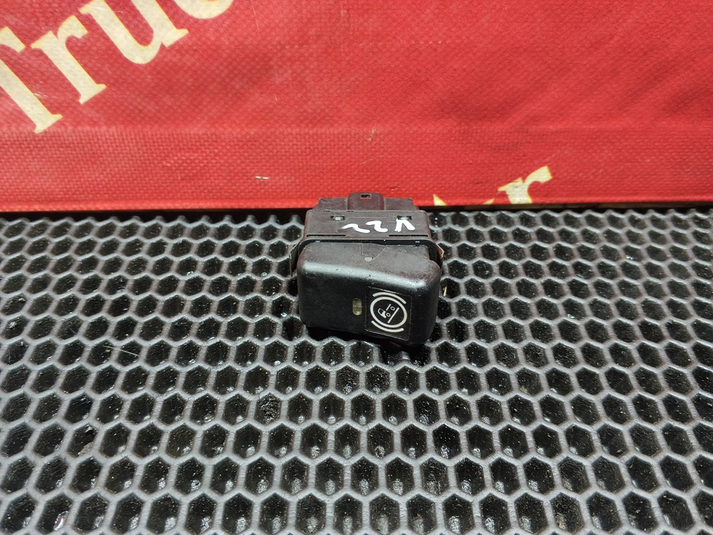 Кнопка противобуксовочной системы