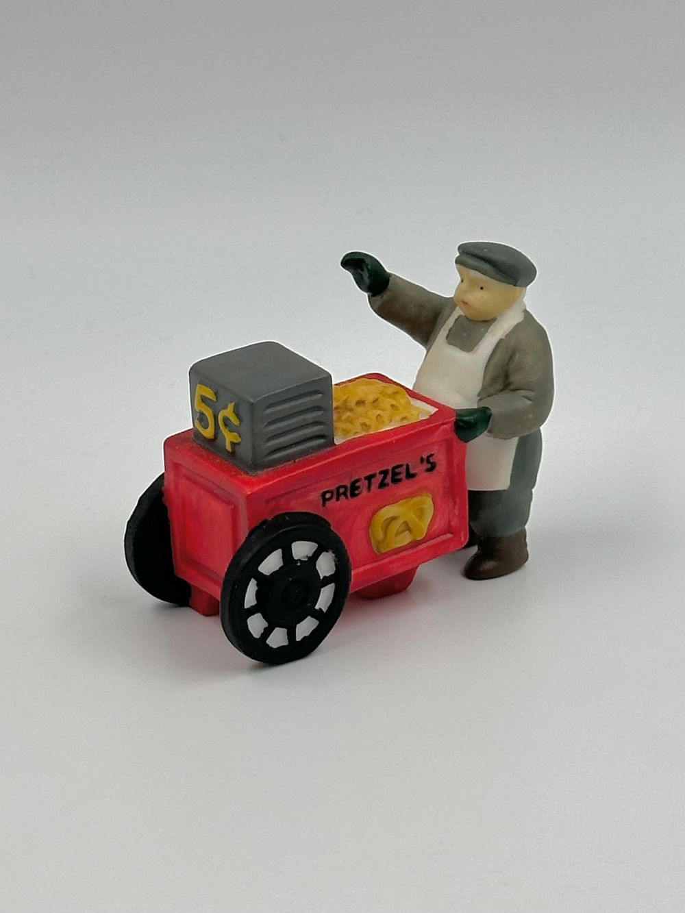 Фигурка Продавец претцелей Department 56