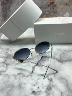 Солнечные очки Prada