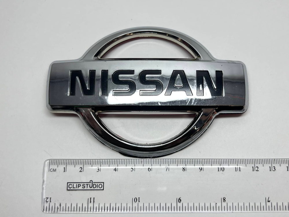 Логотип (шильдик, надпись, эмблема) "Nissan" 12см для крышки багажника / решетки радиатора / капота