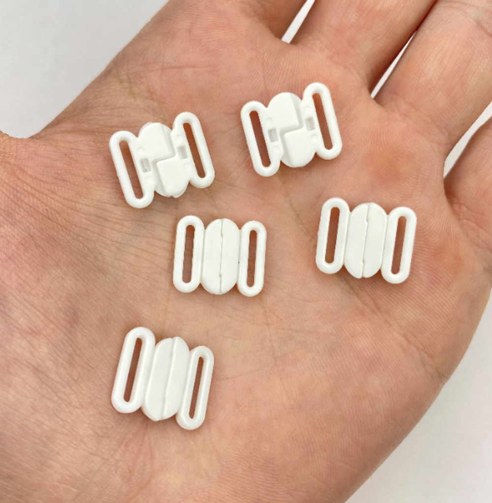 Застежка пластик овал белая 10 мм