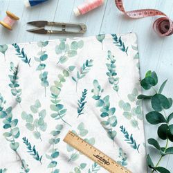 Ткань кулирная гладь акварельные листья на бежевом фоне с узором