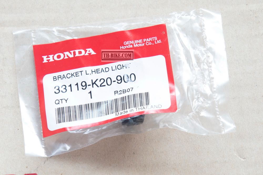 33119-K20-900. BRACKET, L. HEADLIGHT. HONDA