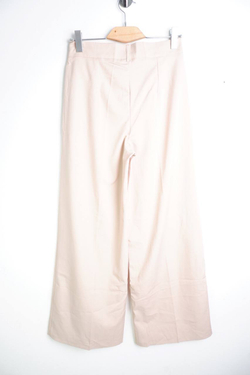 Брюки широкие нежного оттенка, визуально на 48 размер, новые