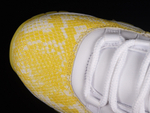 Jordan 11 Retro Low Tour Yellow Snakeskin