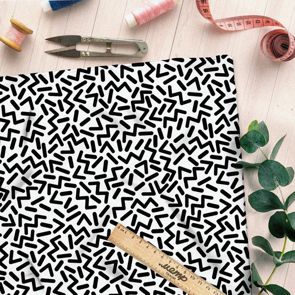 Ткань ниагара черные детальки и буквы