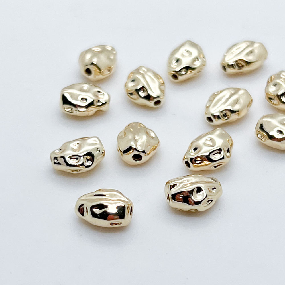 Бусина, цвет золото, размер около 8*6 мм, цена за 1 шт