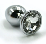 Серебристая алюминиевая анальная пробка с прозрачным кристаллом - 6 см. (Цвет: прозрачный)