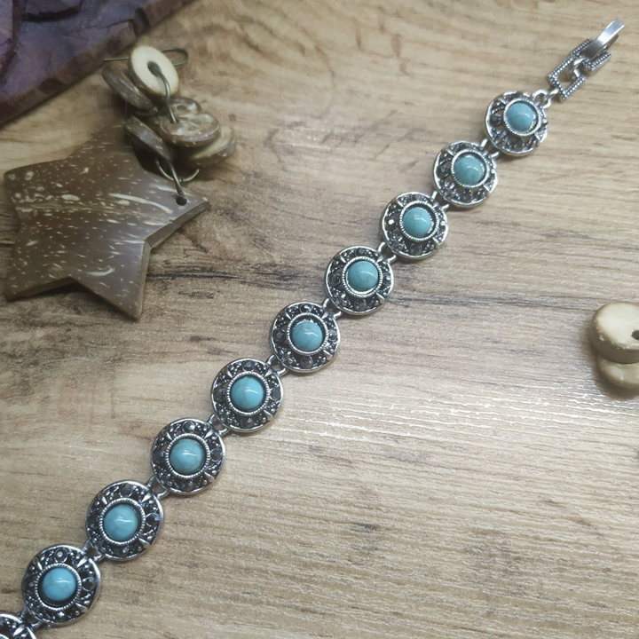 Браслет Vogue Круг бусина под бирюзу стразы графитовые металл серебристый на красном бархате